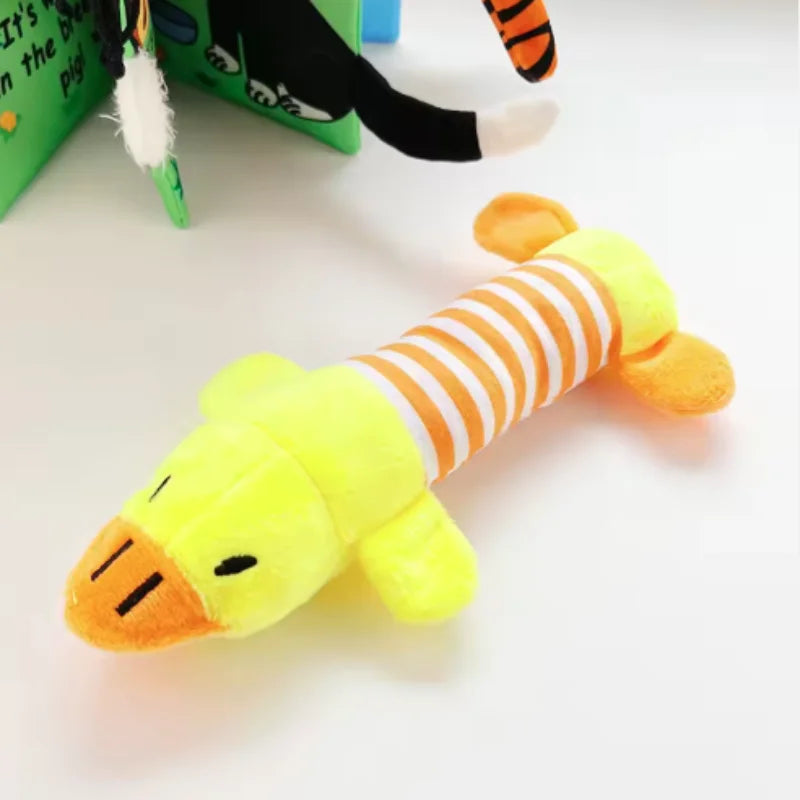 Jouet canard en peluche jaune pour chien – corps rayé orange et blanc, forme longue